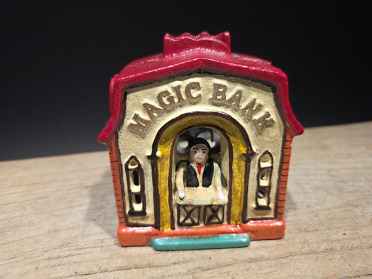 Antique Style Cast Iron Magic Coin Bank