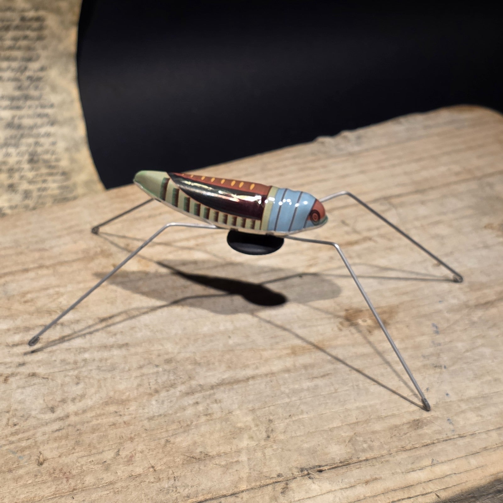 Vintage Style Tin Litho Jumping Grasshopper Toy Suction Cup Hopper Novelty Toy