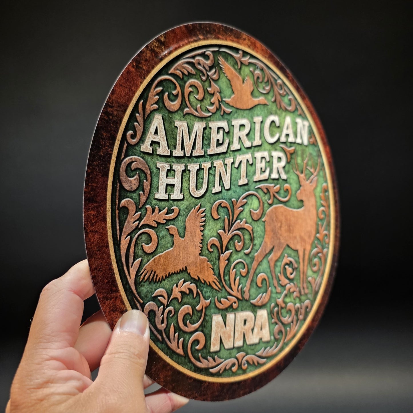 American Hunter NRA Round Metal Sign – Embossed Deer Duck Pheasant Decor