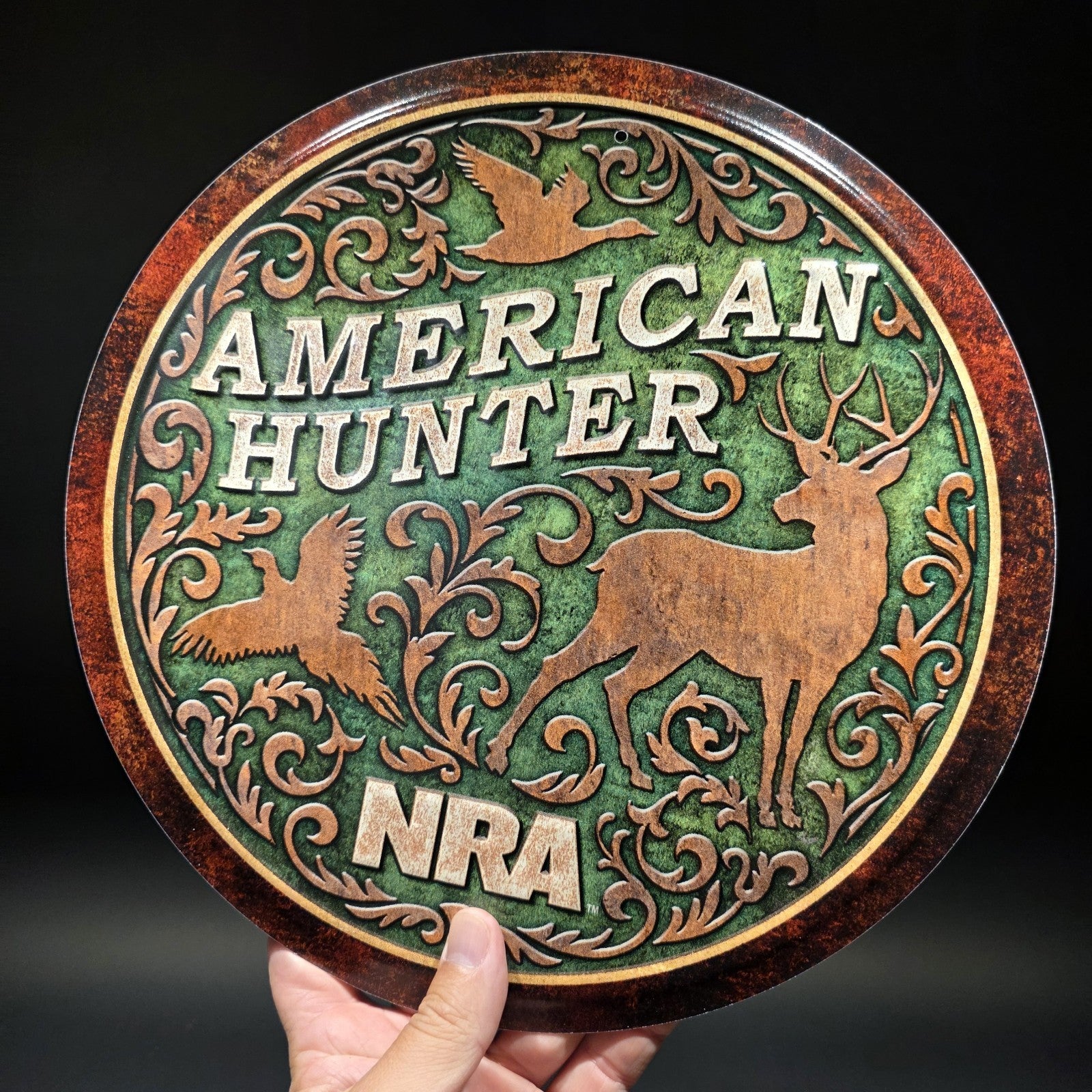 American Hunter NRA Round Metal Sign – Embossed Deer Duck Pheasant Decor