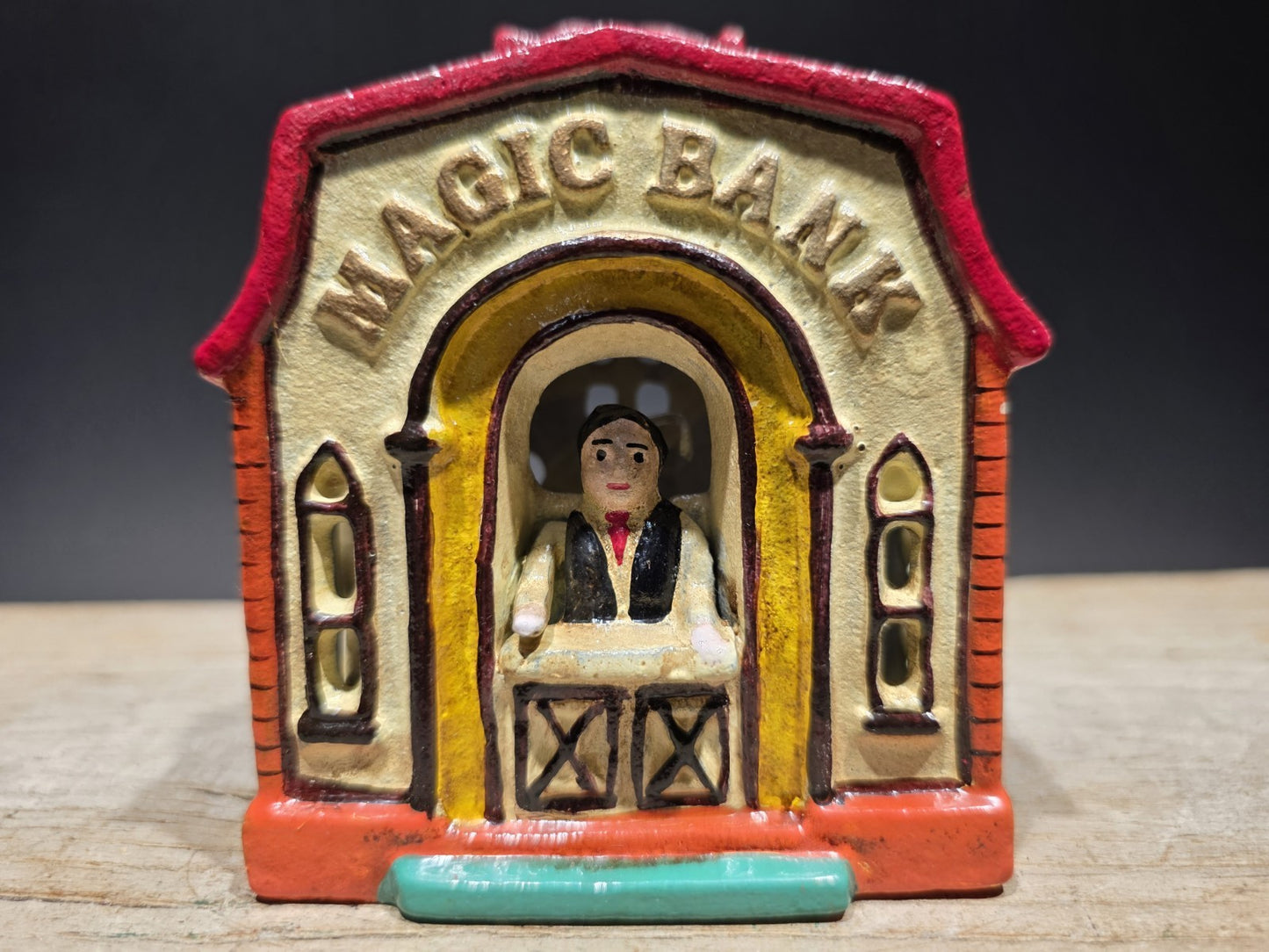 Antique Style Cast Iron Magic Coin Bank