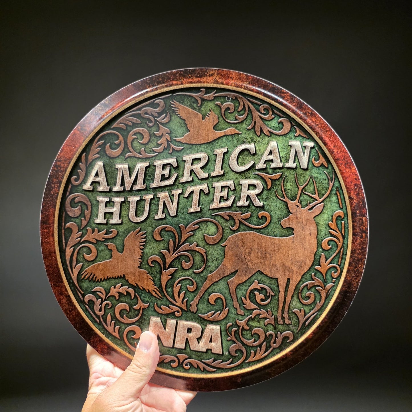 American Hunter NRA Round Metal Sign – Embossed Deer Duck Pheasant Decor
