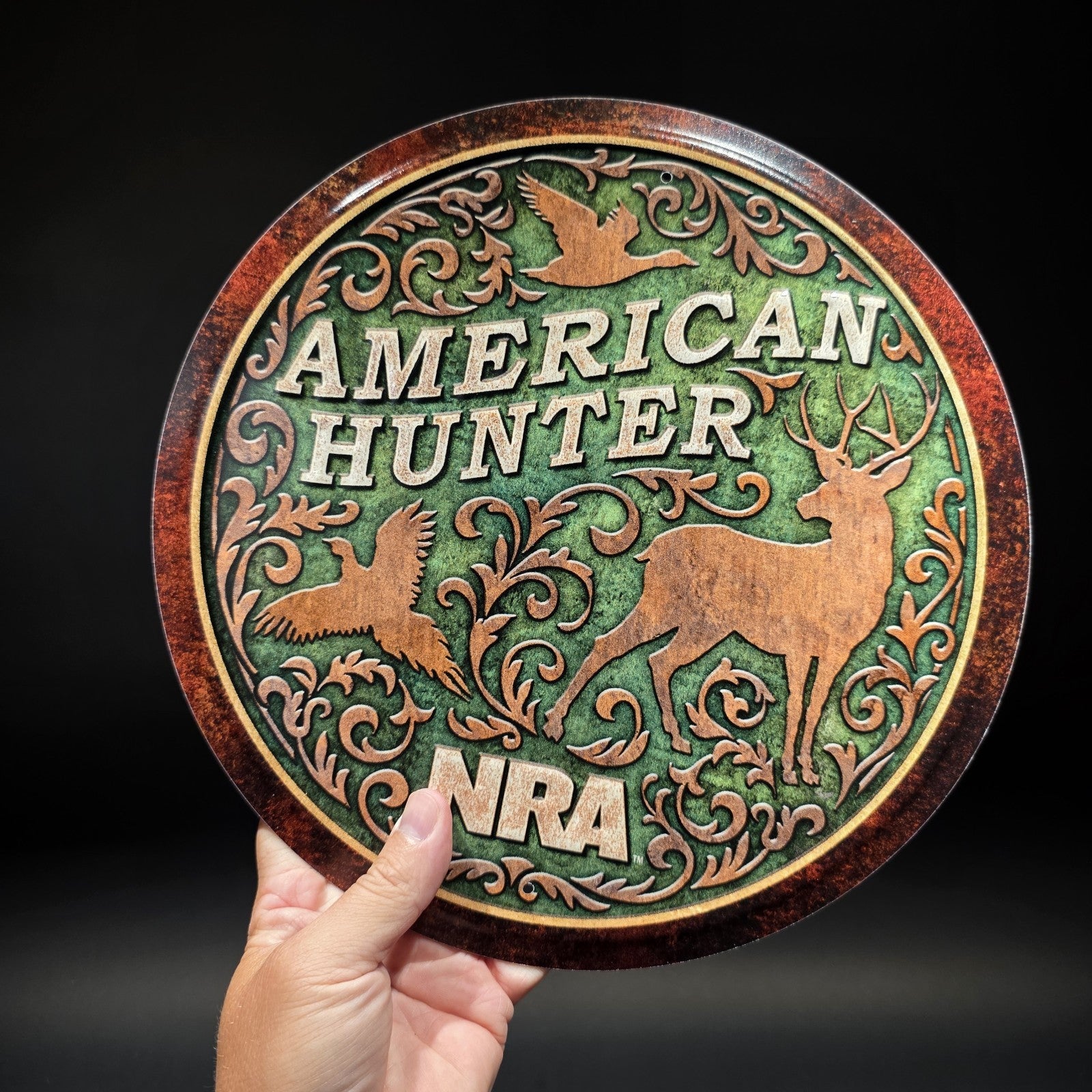 American Hunter NRA Round Metal Sign – Embossed Deer Duck Pheasant Decor