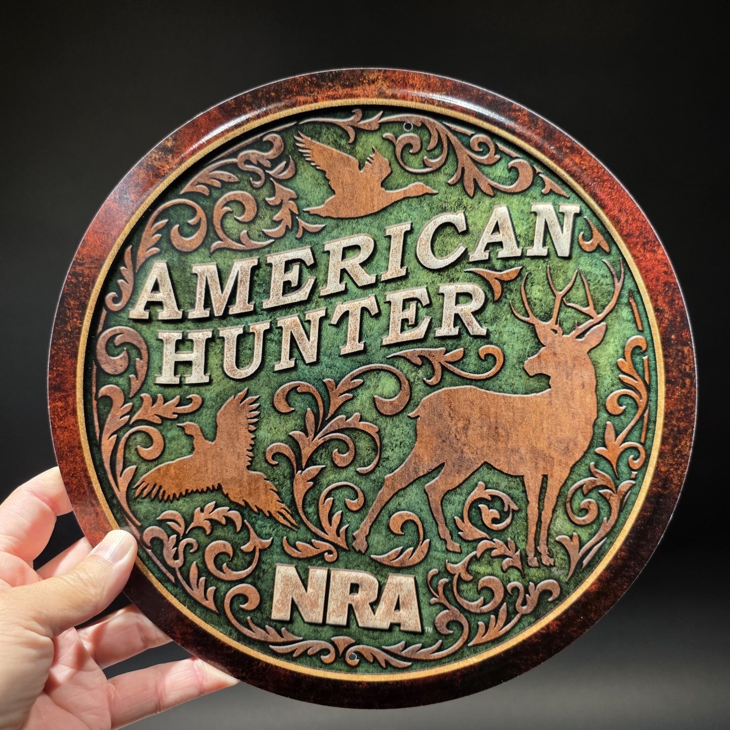 American Hunter NRA Round Metal Sign – Embossed Deer Duck Pheasant Decor