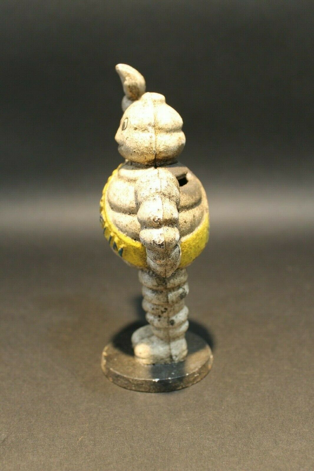 Vintage Style Cast Iron Coin Bank Tire Man - Early Home Decor
