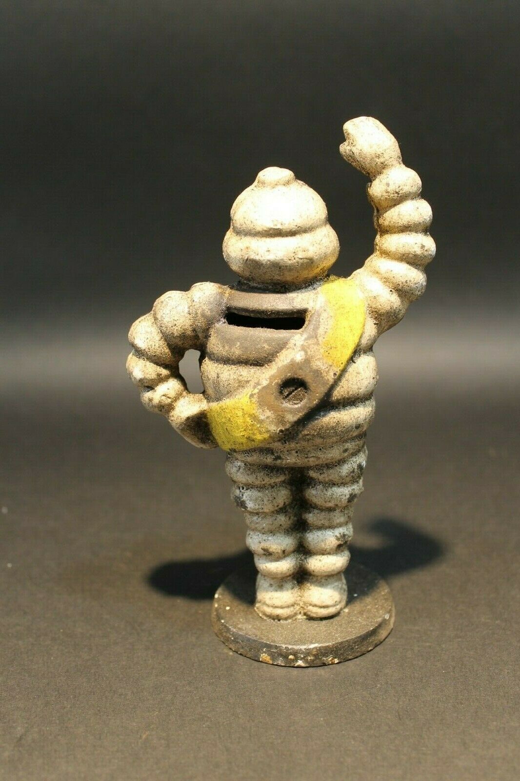 Vintage Style Cast Iron Coin Bank Tire Man - Early Home Decor