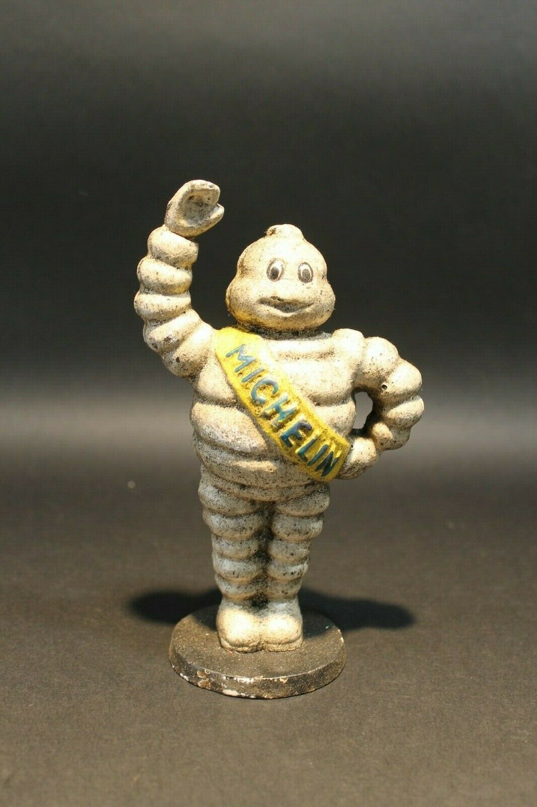 Vintage Style Cast Iron Coin Bank Tire Man - Early Home Decor