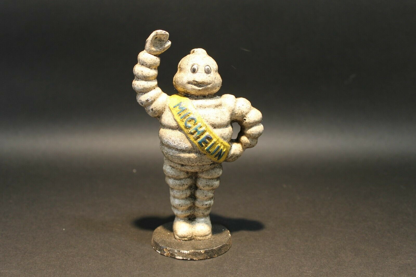 Vintage Style Cast Iron Coin Bank Tire Man - Early Home Decor