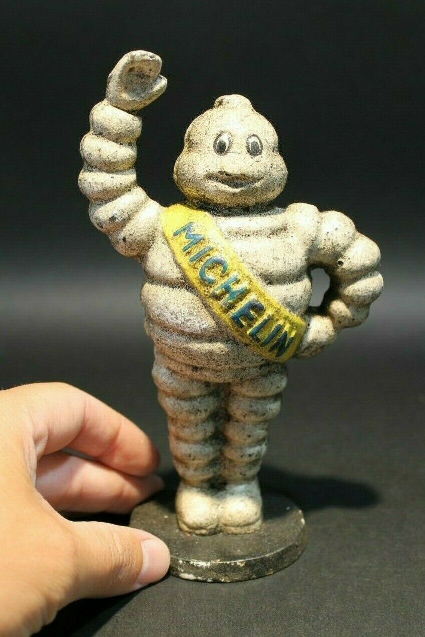 Vintage Style Cast Iron Coin Bank Tire Man - Early Home Decor